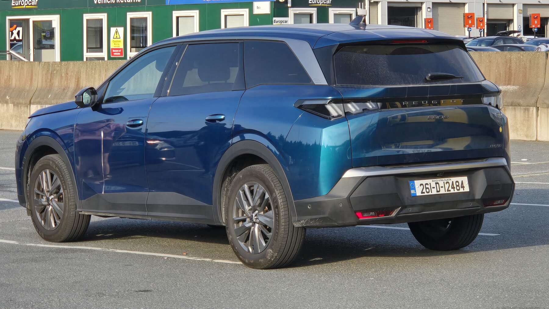 The family’s blue Peugeot 5008 road-trip car